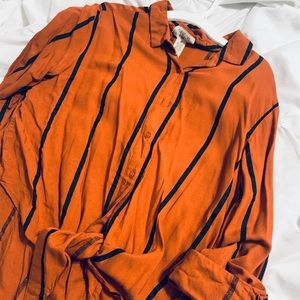 Tan blouse with black stripes tie up